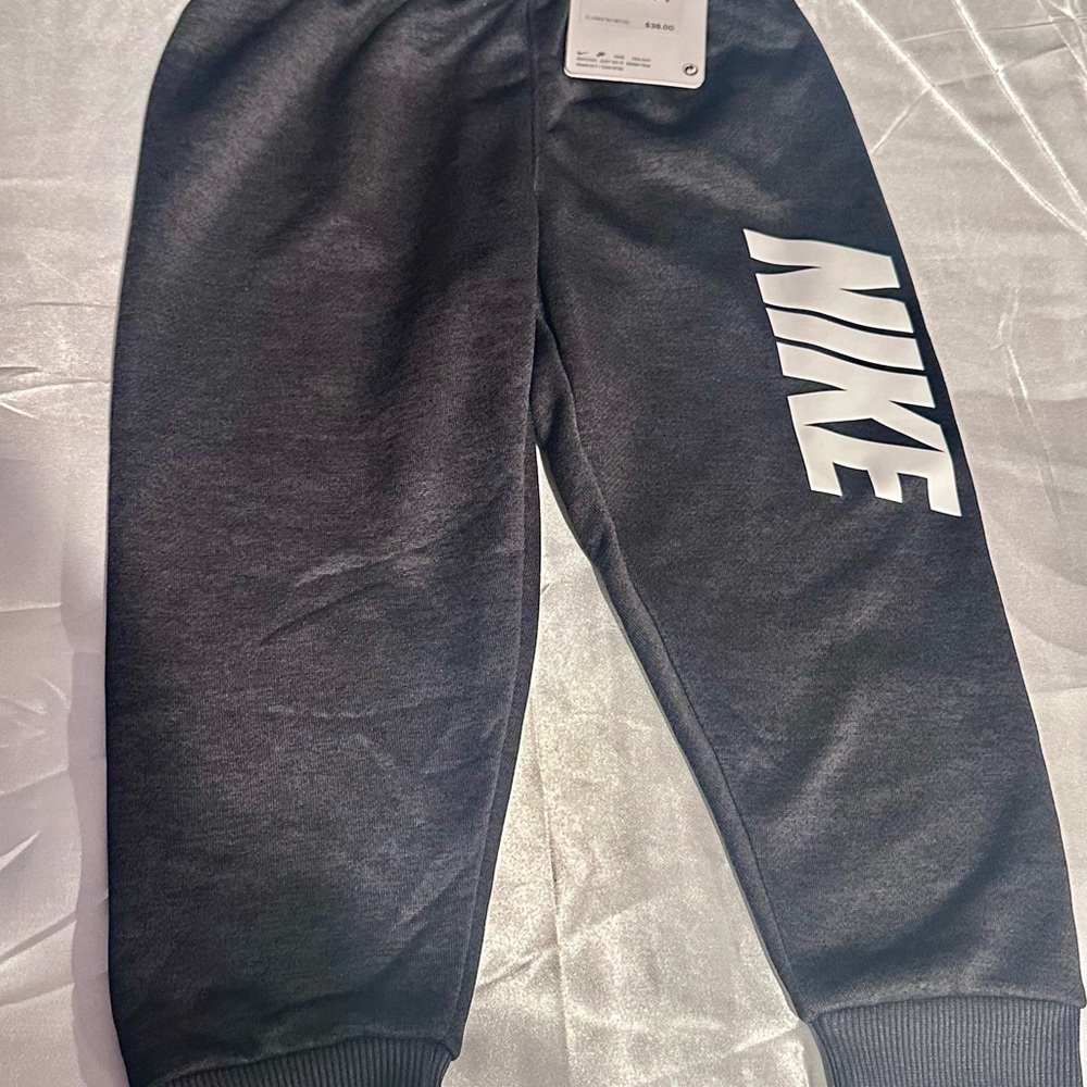 Nike Kids Black Sweat Joggers with White Side Logo